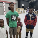 Alexander Prices two older children, Zayvion and Elijah, shown here with two younger brothers, are now old enough to participate in Full Circle 360. Credit: Alexander Price