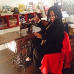 Dorothy J. J. Anderson, fashion designer in Pine Bluff, Arkansas, sits at a paddle sewing machine, the first machine she ever used to sew clothing -- after having sewn dresses by hand as a child. She owns Dorothies Custom Dezignz.