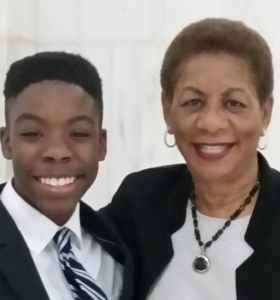 Pine Bluff resident Caleb Olumofin and Mayor Shirley Washington at the signing of The Delta Rhythm & Bayous Highway Act on March 31, 2017. Credit: Colette Ficklin