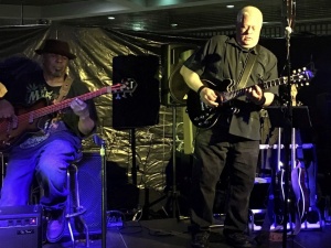 Roscoe Willis (left) and Dave Sadler on stage during a performance with Detroit Johnny. Visit davesadlermusic.com for more information.