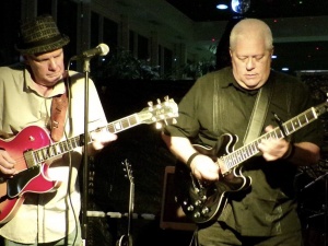 Jim Turner (left) and Dave Sadler on stage during a performance with Detroit Johnny. Visit davesadlermusic.com for more information.